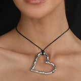 MELTED HEART SILVER PENDANT